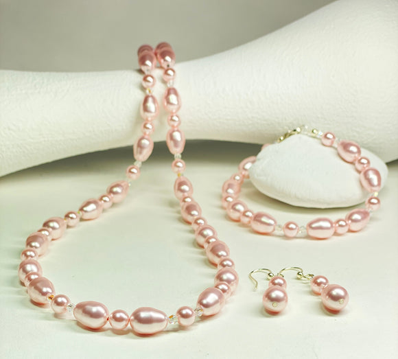 Light Rose coloured Austrian crystal Pearls and Austrian Crystal Necklace, Bracelet and Earring set.